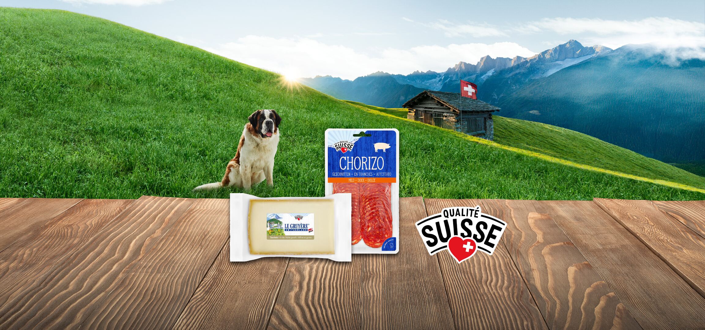 Chorizo, Gruyère suisse et poires sur fond de paysage suisse.