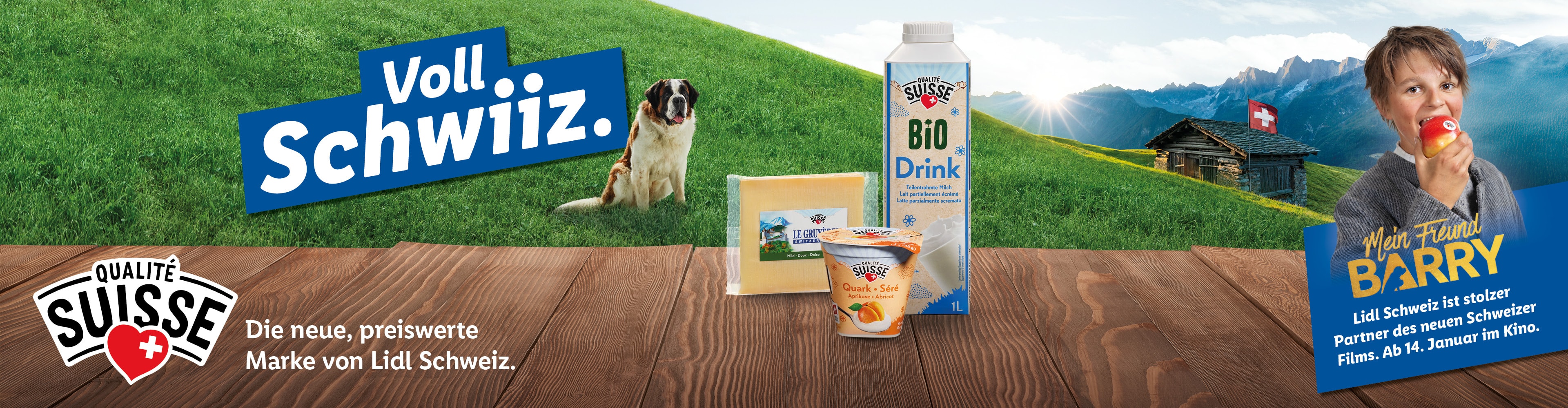 Lidl Schweiz Werbung mit Qualité Suisse Milchprodukten, einem Bernhardiner und einem Apfel essenden Kind vor Alpenkulisse.